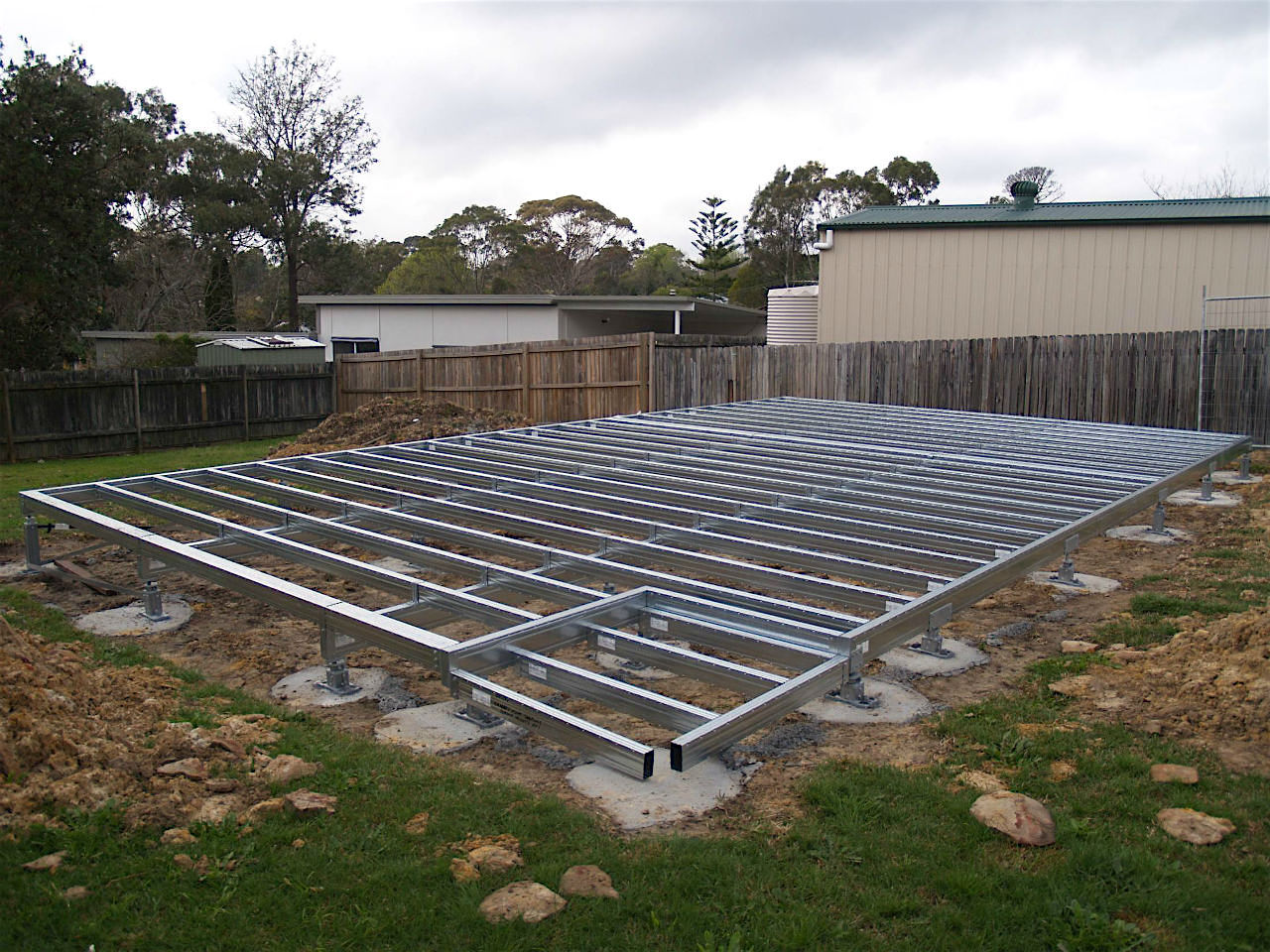 Boxspan steel bearers and joists floor frame for a granny flat in a suburban backyard
