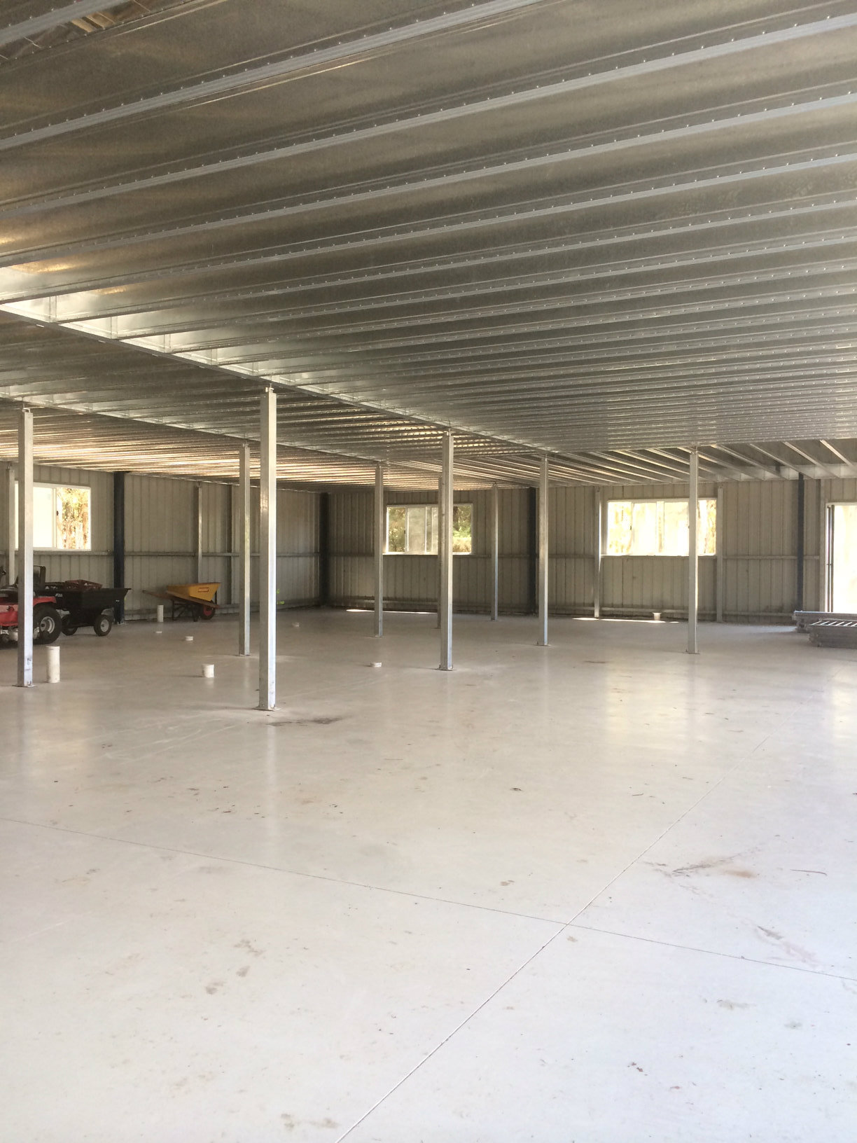 Boxspan mezzanine floor frame providing storage space in a shed
