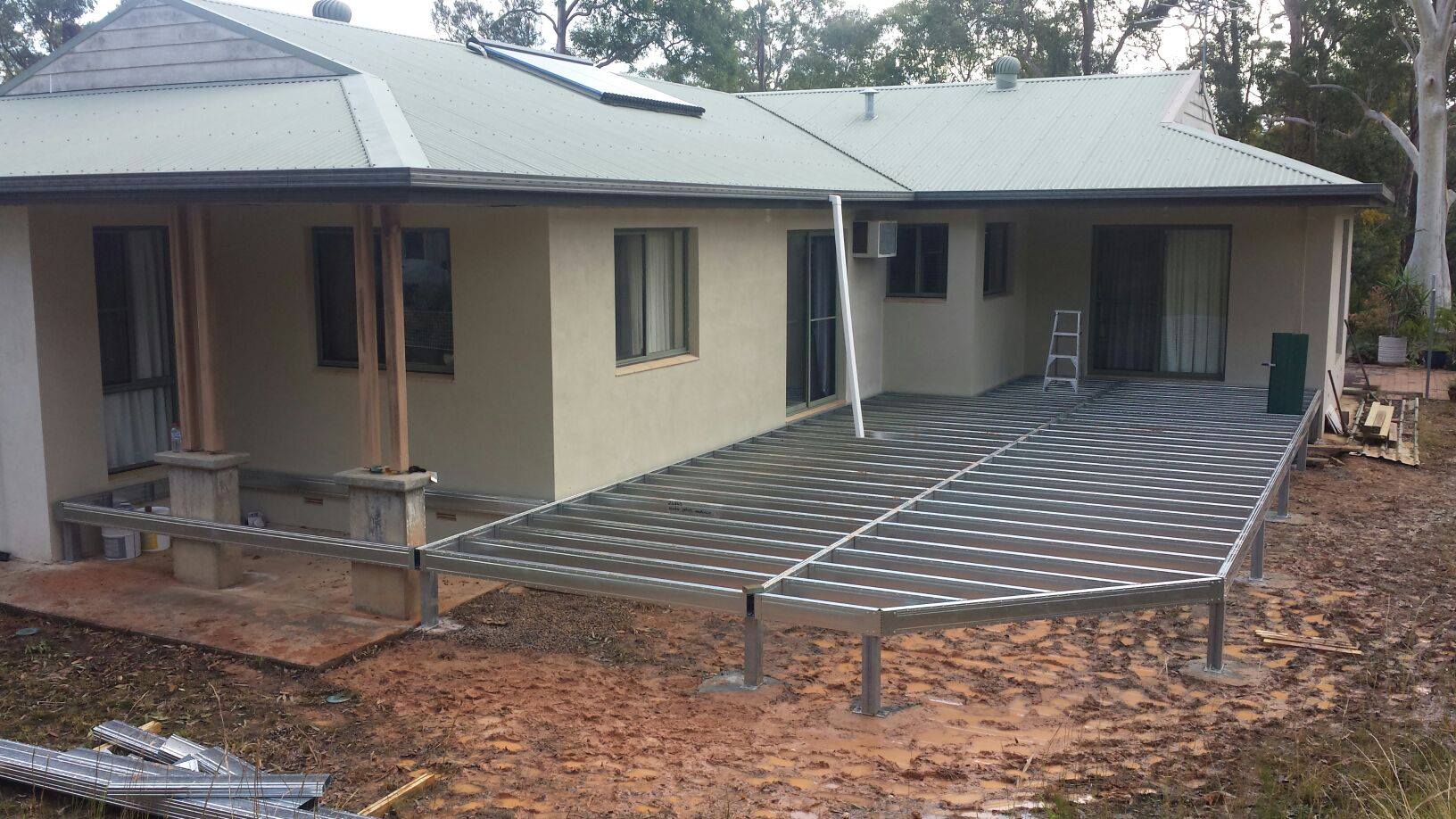 Boxspan deck frame added to existing house increasing the outdoor living space